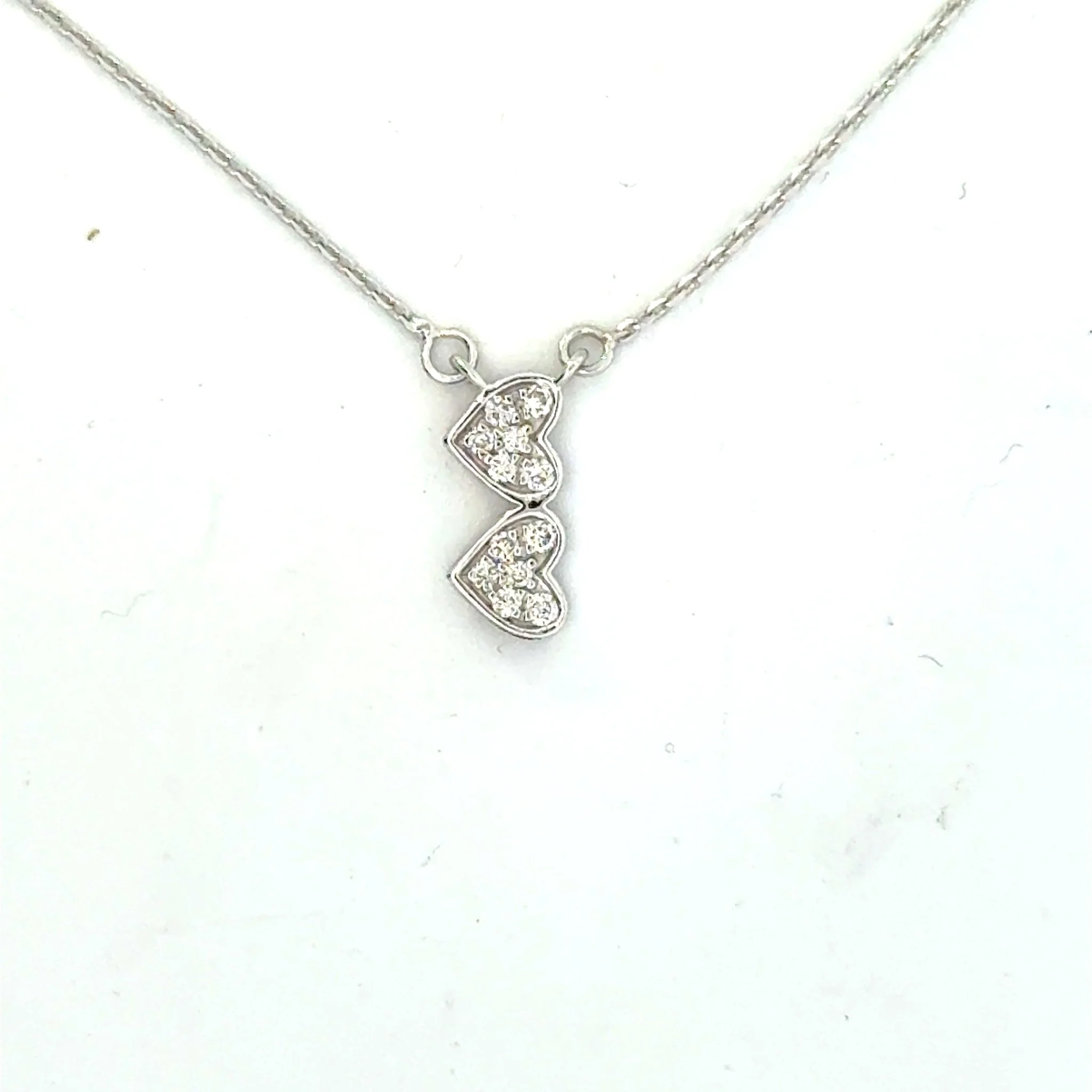 14 Karat White Gold Double Heart Drop Pendant With Diamonds